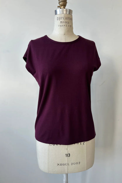 The Eowyn T-Shirt by Kollontai in Burgundy is shown on a white mannequin against a white background.