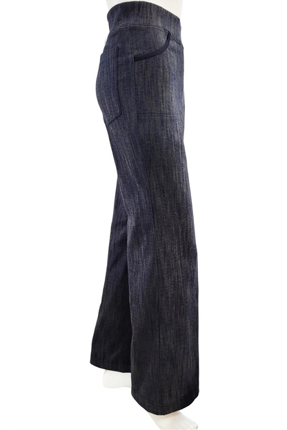 A side view of the Wade Vintage Denim Pants in Indigo by Mandala  shown on a mannequin against a white background. 