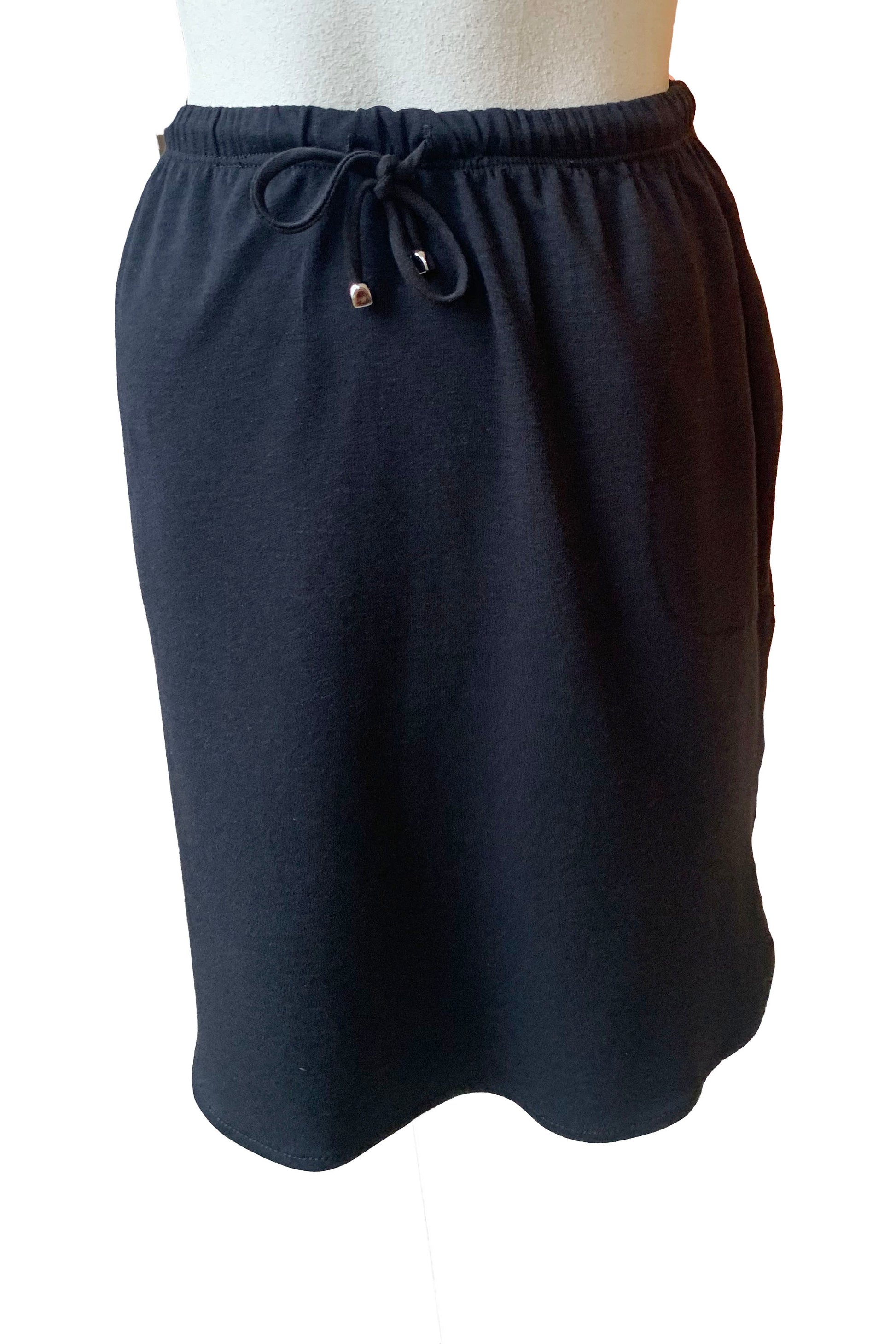  Casey Skirt by Pure Essence, Black, elastic waist with drawstring, side pockets, above the knee length, rounded hem is higher at the sides, eco-fabric, bamboo and cotton, sizes XS to XXL, made in Canada