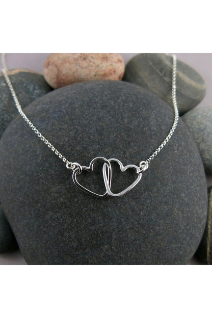 Hearts Embrace Necklace: Sterling Silver