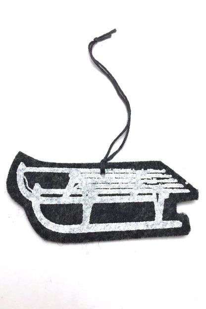 White sled ornament detail